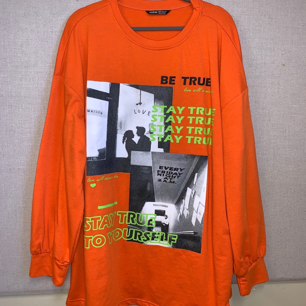 Orange "stay true" shirt